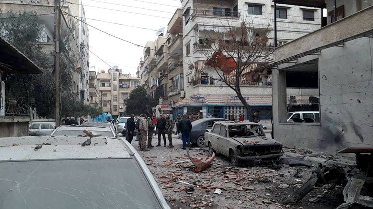 Zerstörte Straßenzuüge nach einem Granatenangriff in Damaskus. (Foto: Caritas International)